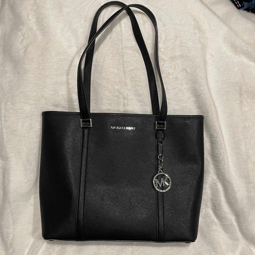 Michael Kors Black Sady Purse. Saffiano leather with silver accents